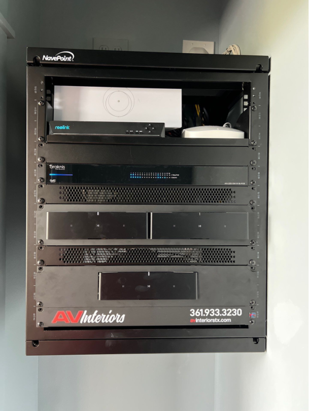 AV Interiors network rack with audio equipment