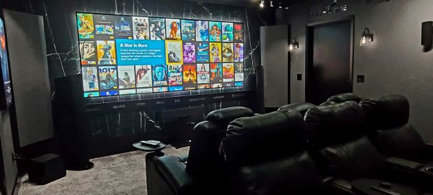 Home theater screen displaying movie selection